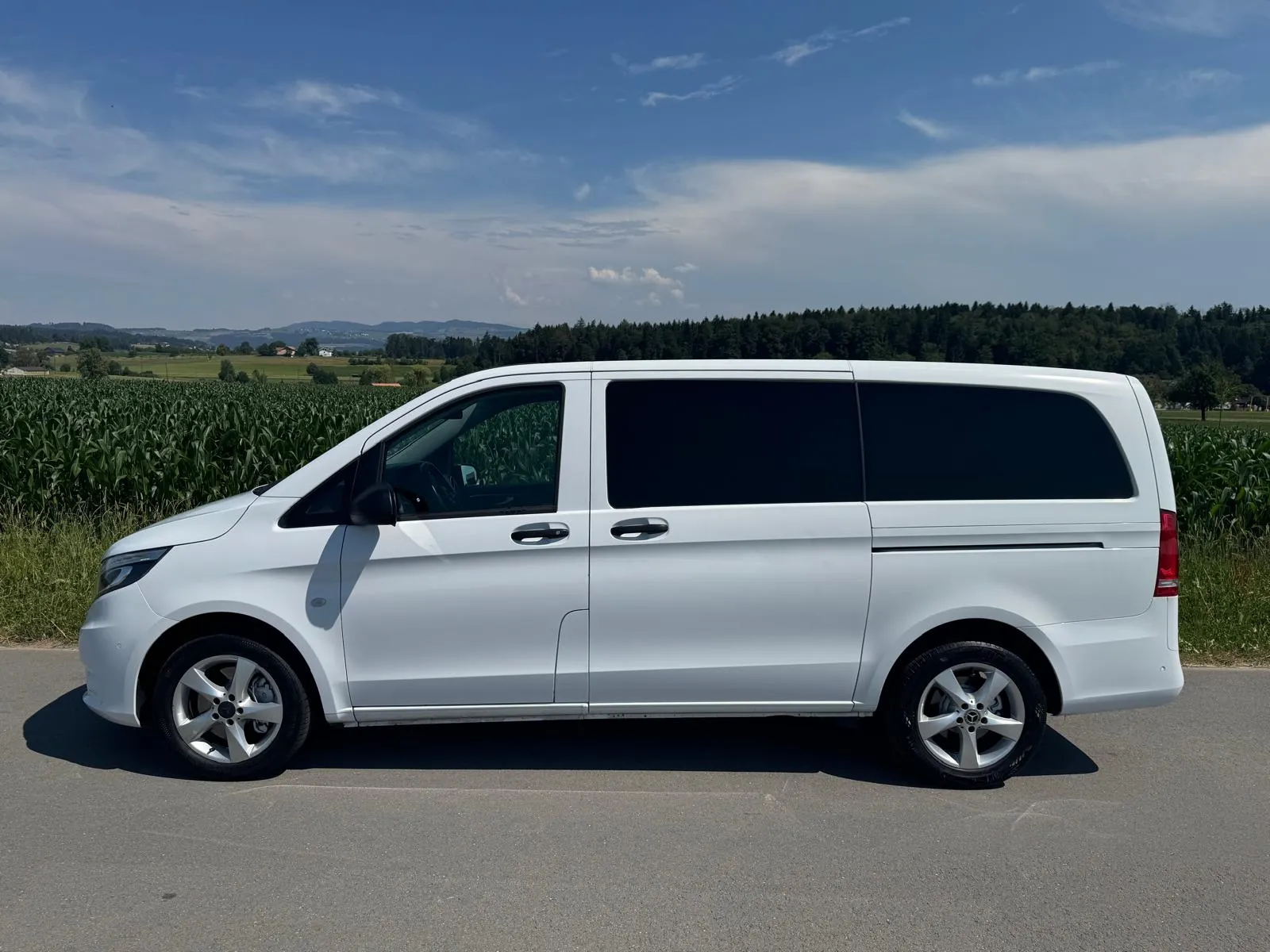 White Mercedes Vito nine-seat van used for private group transfers in Tuscany